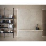 Portland One Bianco concrete-effect porcelain tiles laid across a bright open-plan interior floor