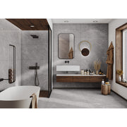 Nexus Imperio grey polished porcelain tiles fitted across a wall in a contemporary interior