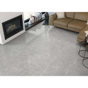 Pietra Lagos grey polished porcelain tiles laid across the floor and walls of a modern interior