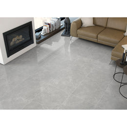 Pietra Lagos grey polished porcelain tiles laid across the floor and walls of a modern interior