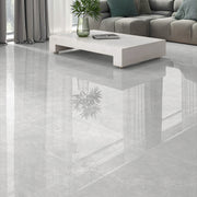 Pietra Lagos pearl polished porcelain tiles used across the walls and floor of a light contemporary interior