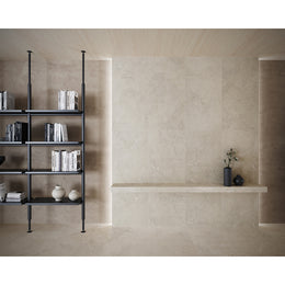 Portland One Bianco concrete-effect porcelain tiles laid across a bright open-plan interior floor